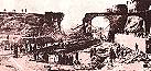 Altra immagine dei lavori 1883-89, con evidenza del vecchio ponte in pietra che collegava la città con Porta Lecce