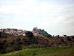 Il castello di Squillace visto dalla valle sul fondo della collina dove sorge il borgo di Squillace