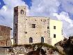 Nella foto di Dario D'Elia la casa-torre di Via SS. Quattro, dal sito www.terracinese.com