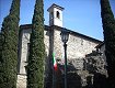 La chiesa di Santa Maria col tricolore in primo piano