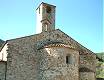 La pieve di Legri con abside circolare vista dalla strada principale del paese